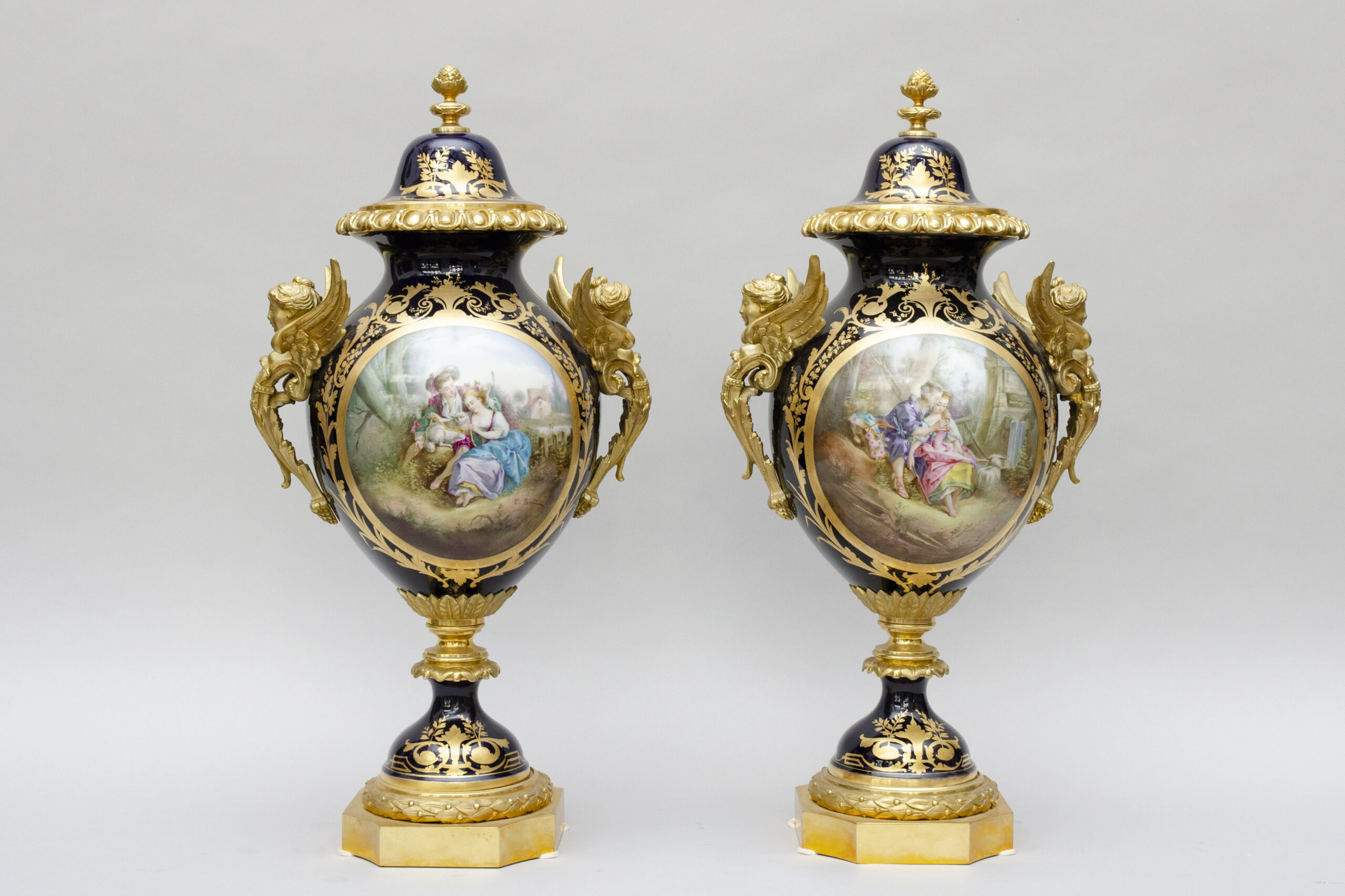 Pair of cobalt bleu ormulu vases with winged women's busts, Sèvres style