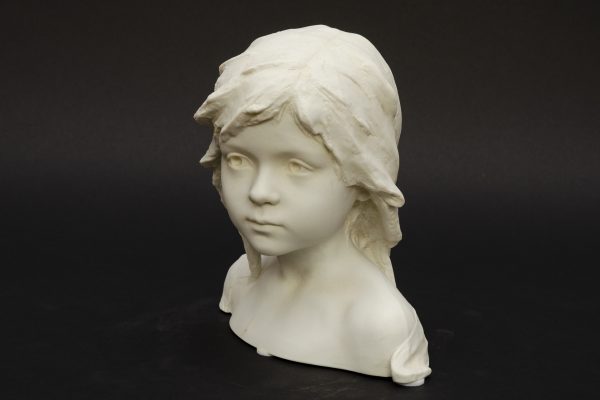 Bisque bust of young child, Jacobs